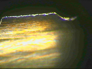 4a m12 before mf - 2tooth, jagged and burrs, 80-magnification 4a m12 before mf - 2tooth, jagged and burrs, 80-magnification